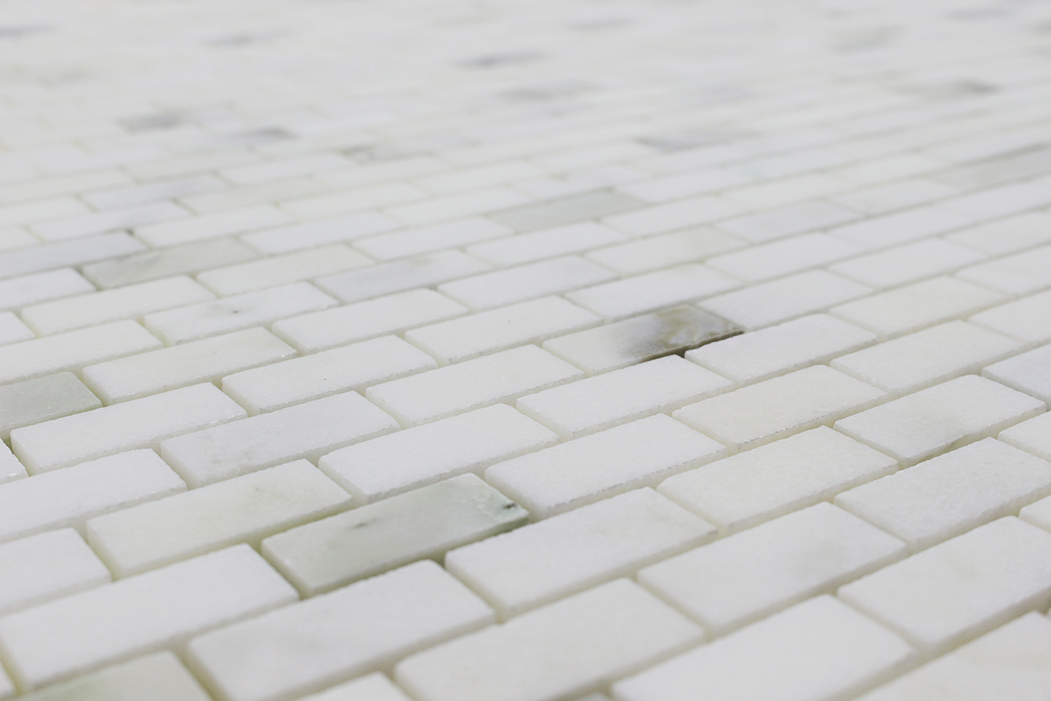 Calacatta Oliva 5/8 x 1 1/4 Offset Mosaic Tiles