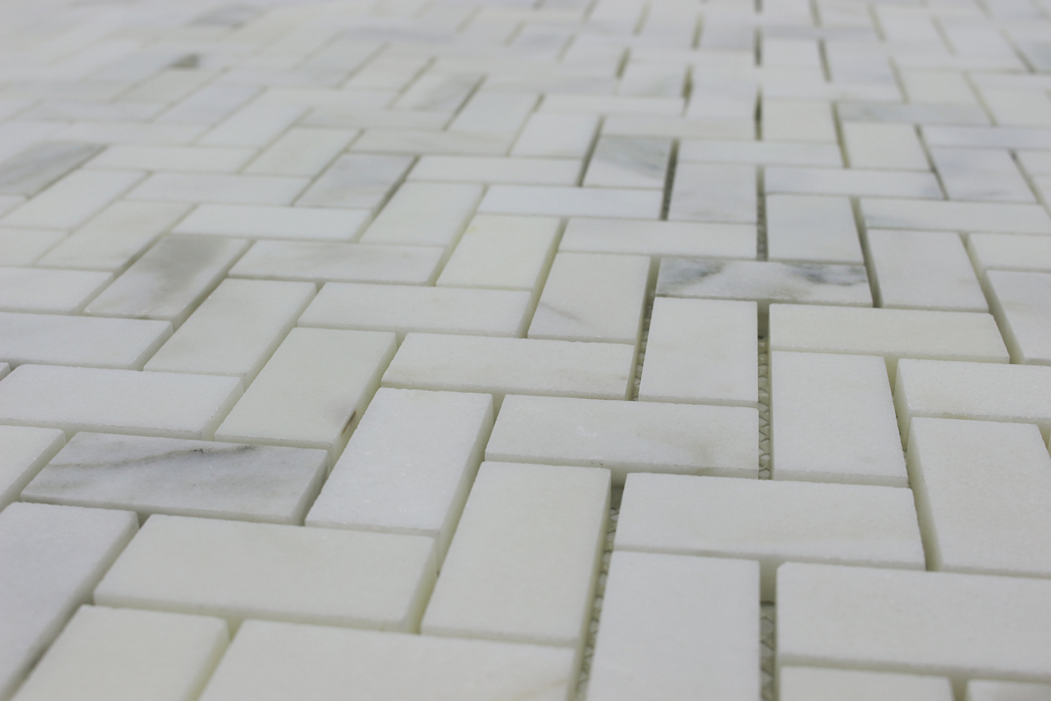 Calacatta Oliva 1X2 Herringbone