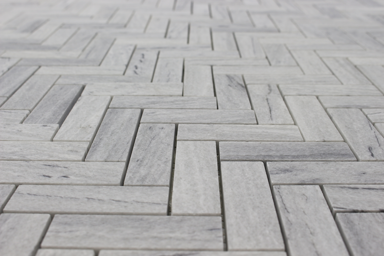 Solto White 1×3 Herringbone Honed