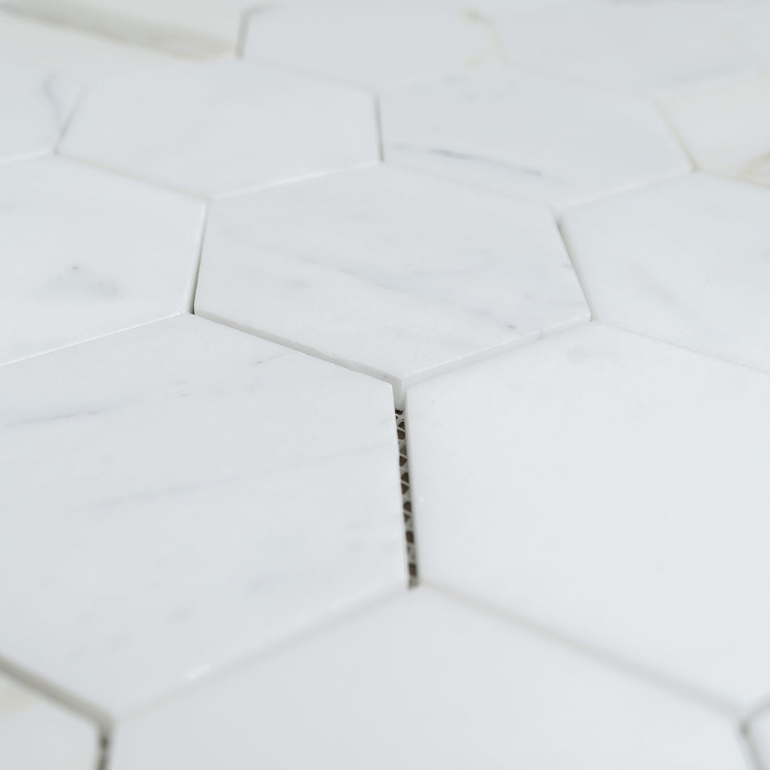 Calacatta Gold 4″ Honeycomb Honed